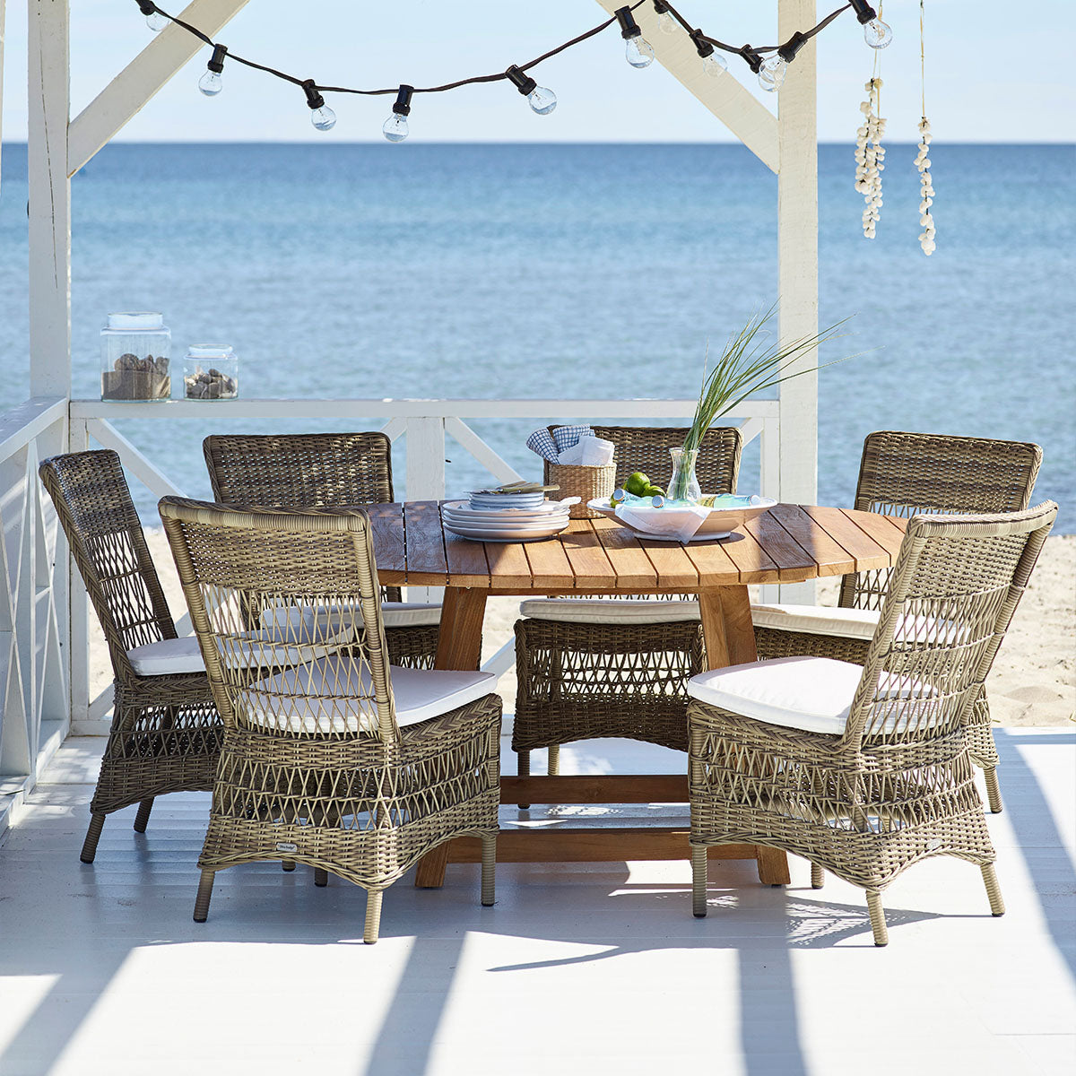 Teak table with on sale wicker chairs